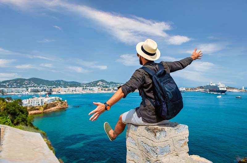 a man looking over a bay